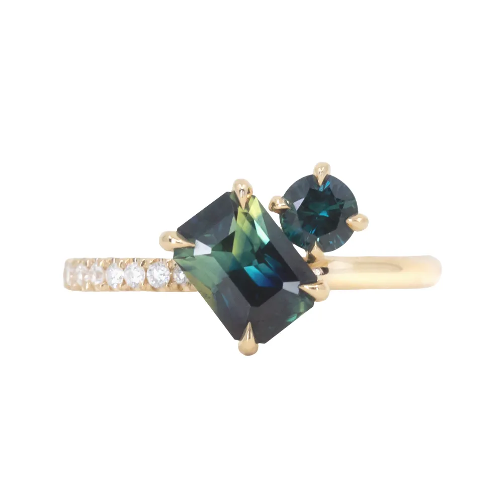 1.32ct Askew Emerald Cut Parti Sapphire and 0.31ct Round Sapphire Ring with asymmetrical diamonds in 18k Yellow Gold