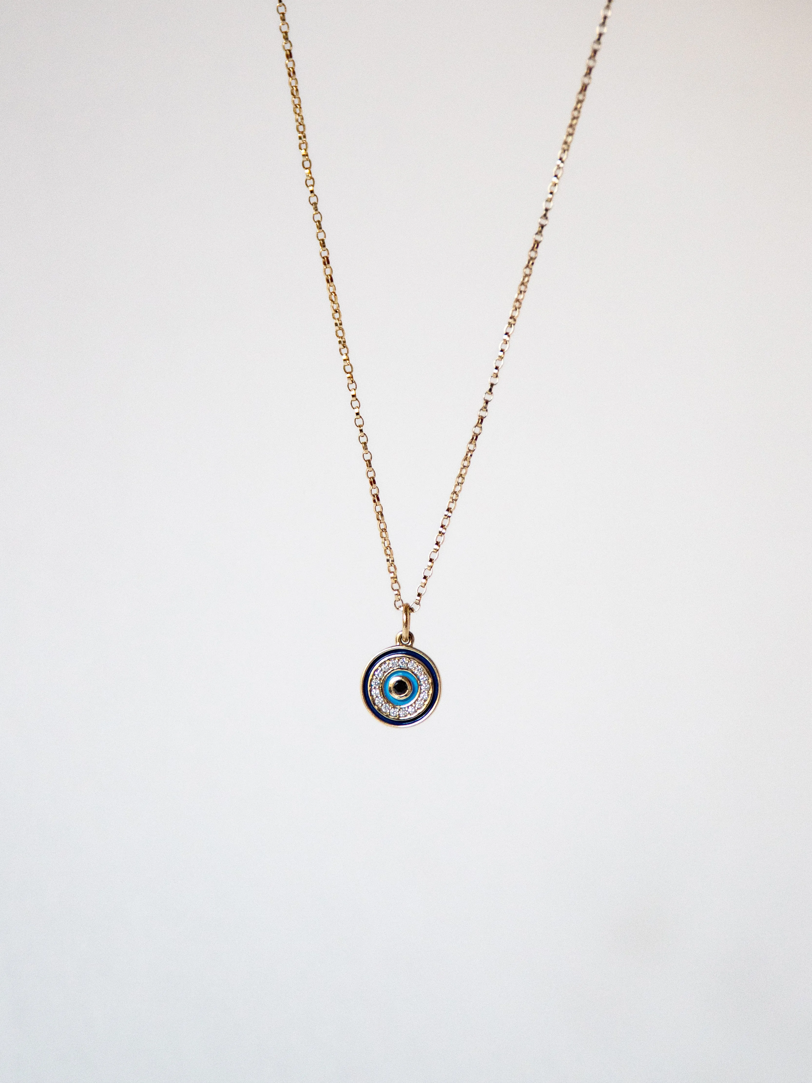 Diamond and Gold Evil Eye Pendant